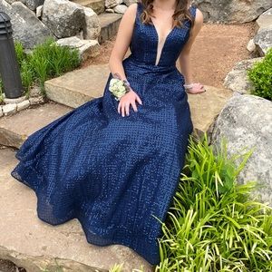 Formal prom dress from Val Stefani, navy in color, size 8.